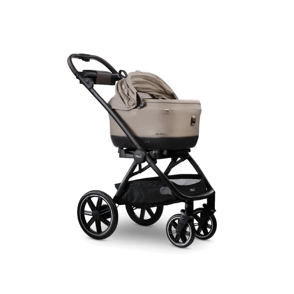 Beżowa i czarna wózek Tru Baby z miękkim materiałem do noszenia.