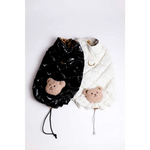 Black and white puchowy bezrękawnik dla psa with plush teddy bear appliqués made of jedwab featuring obwód szyi detail