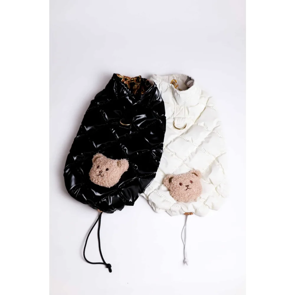 Black and white puchowy bezrękawnik dla psa with plush teddy bear appliqués made of jedwab featuring obwód szyi detail