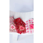 Three heart-shaped fabric patches with true love coco embroidered messages on red tweed chusta true love fabrics