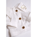 White linen cardigan for dogs with gold-tone buttons and embroidered logo ideal for cieplejsze dni and dla psa use