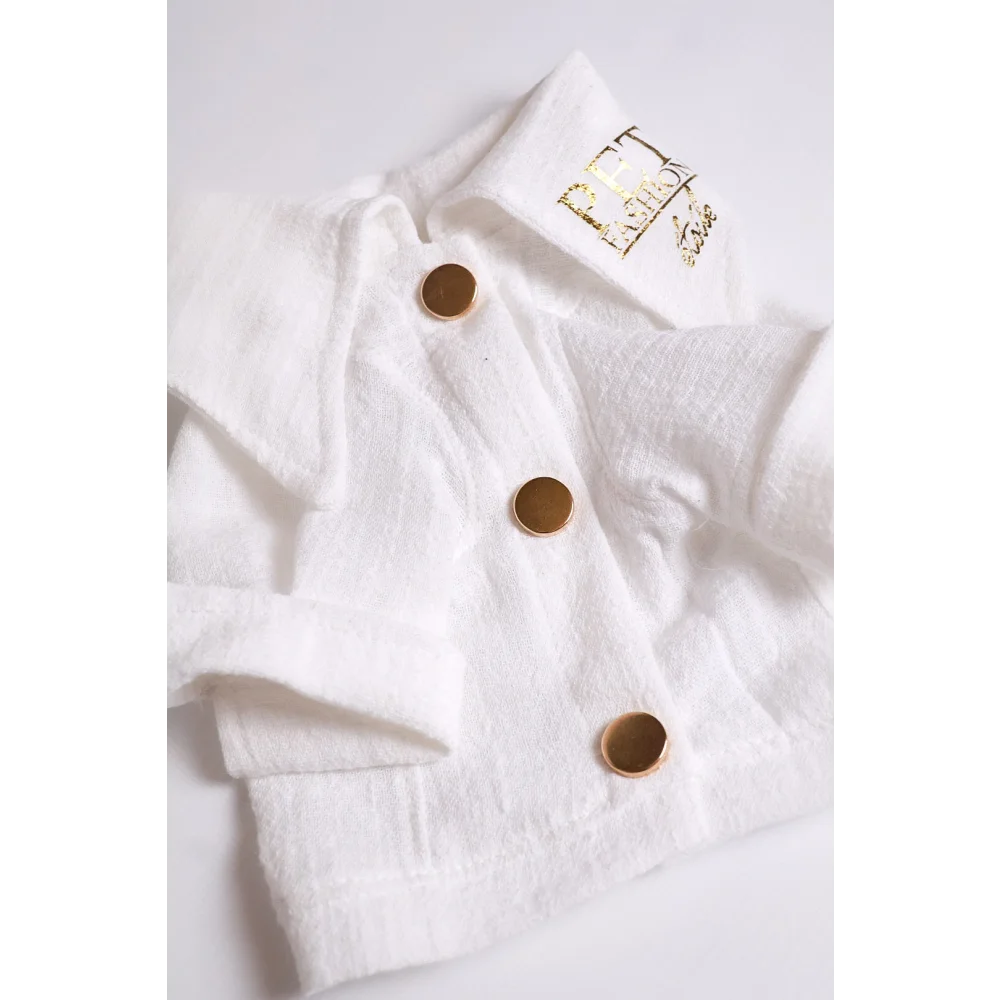 White linen cardigan for dogs with gold-tone buttons and embroidered logo ideal for cieplejsze dni and dla psa use