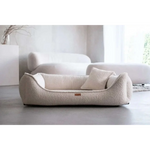 Cream-colored plush fleece dog bed with cushioned interior and pillow in legowisko belluno boucle beige style