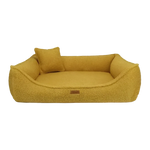 Legowisko belluno boucle mustard to przytulne, musztardowo-żółte legowisko dla psa z miękkiego tkanego materiału i poduszką