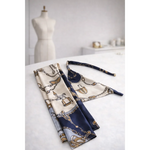 A navy and cream silk riviera set featuring elegant gold chain-link and buckle patterns for jedwabne apaszki dla psa