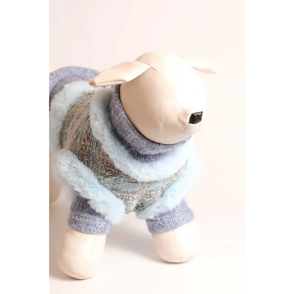 A plush sheep figurine in a blue woolen pet fashion etoile sweterek wełniany z golfem dla psa with wywijany golf