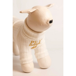 Cream-colored knitted wool sweater with gold embroidered pea logo for plush dog figurine in pet fashion etoile style