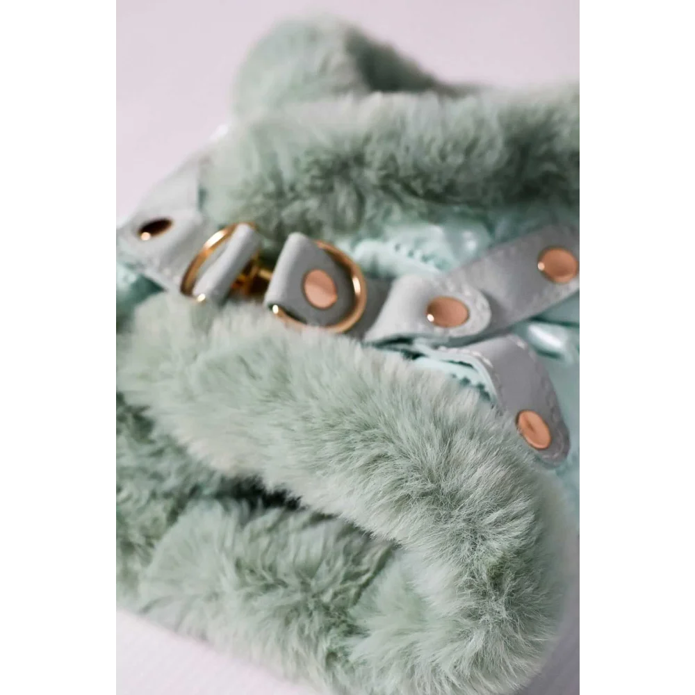 A mint green szelki bezuciskowe dog harness with miękka futrzana podszewka and najwyższej jakości 24k gold hardware