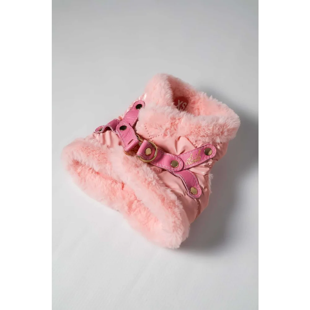 Pink faux fur-lined winter boot with pink leather straps and gold-tone buckles suitable for zestaw 2w1 obwód klatki and szyi measurements